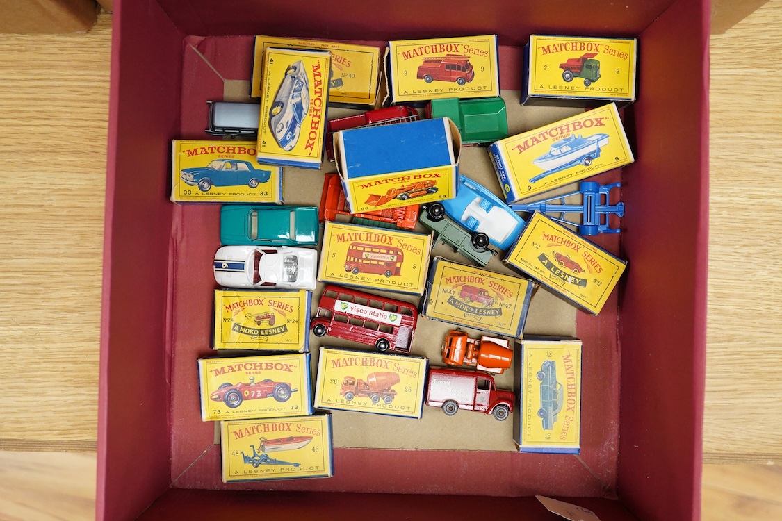 Fifteen boxed Matchbox Series 1-75 regular wheels vehicles including; Trojan van (47), Routemaster bus (5), Cement Lorry (26), Ford G.T. Racing Car (41), Ford Zephyr (33), Long Distance Coach (40), etc.